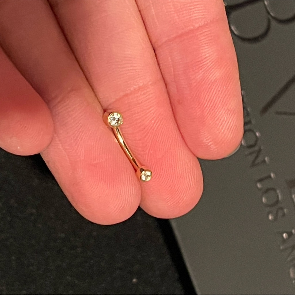 Gold Curved Barbell With Clear Gems